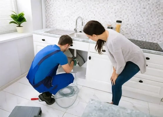 plumber perform drain cleaning